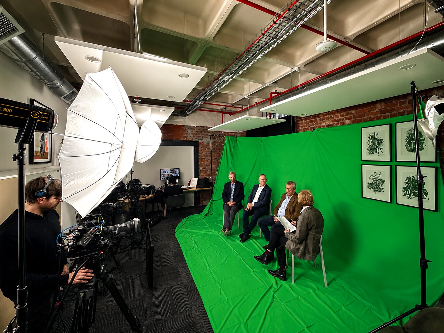 Multi-camera green-screen panel production inside Studio17